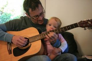 Playing guitar with Daddy! (We have a similar photo like this with Raven)